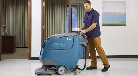 Man uses floor machine