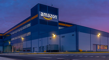 Szczecin, Poland-November 2018: Amazon Logistics Center in Szczecin, Poland in the light of the rising sun,panorama