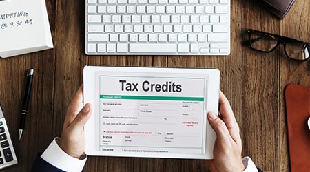 Tax Credits Claim Return Deduction Refund Concept