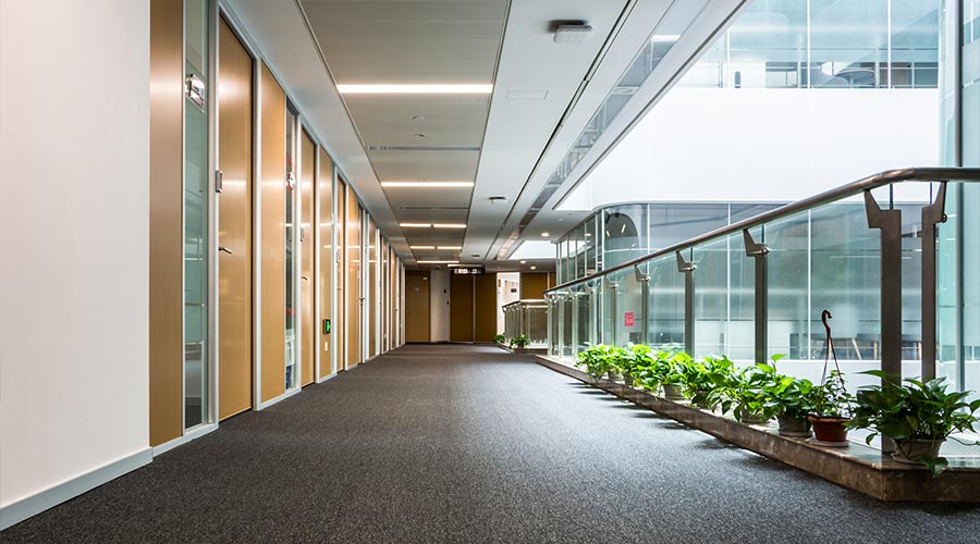 school, education and learning concept - empty school corridor